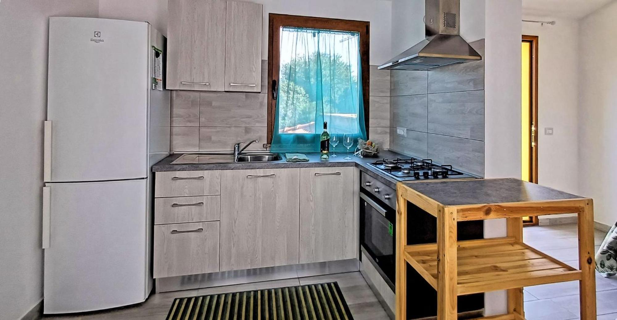 New Alfieri Apartment Cabras Bagian luar foto